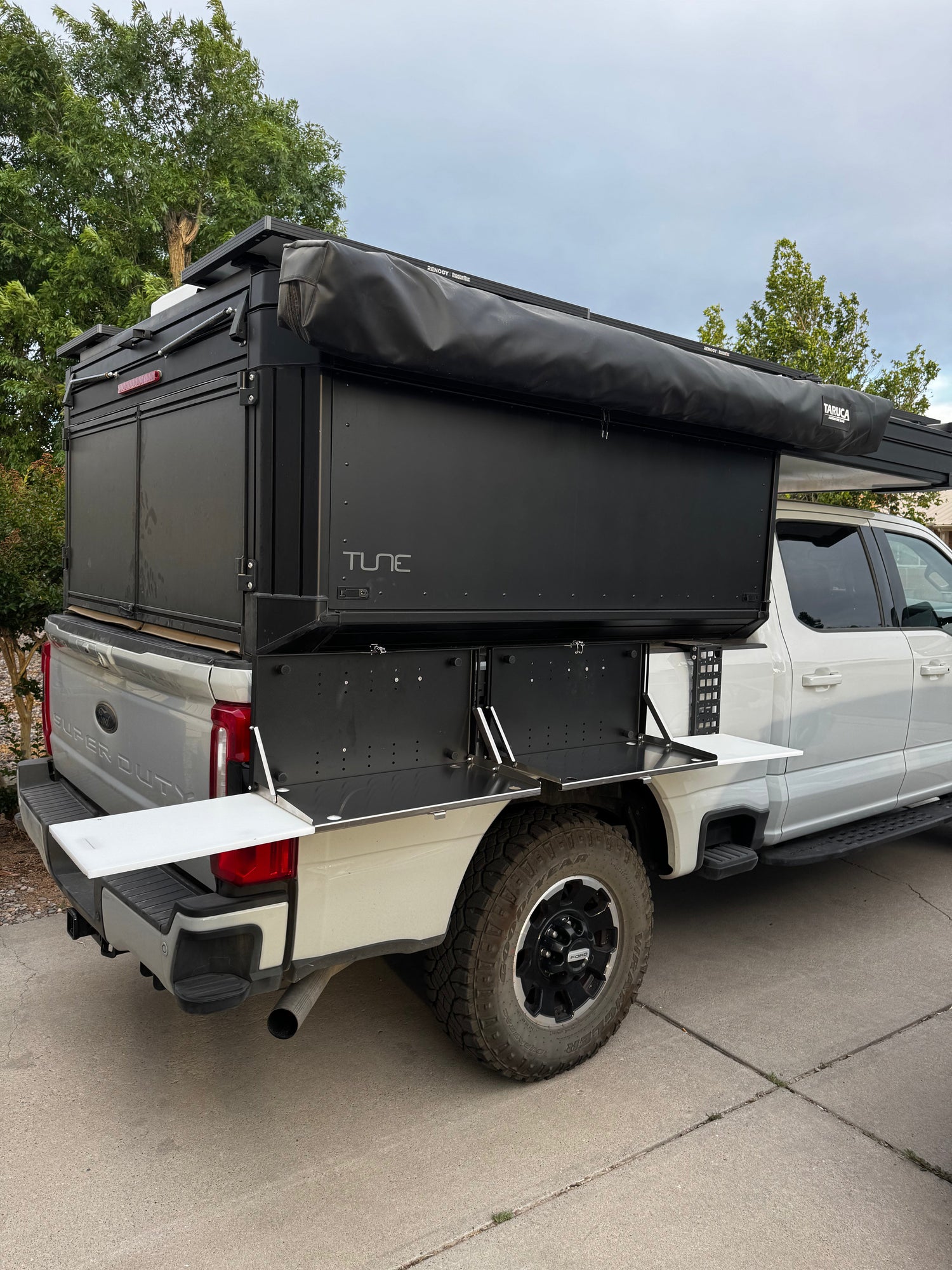 rigd tables mounted with STAPLL fender rack brackets - truck storage solutions for truck campers
