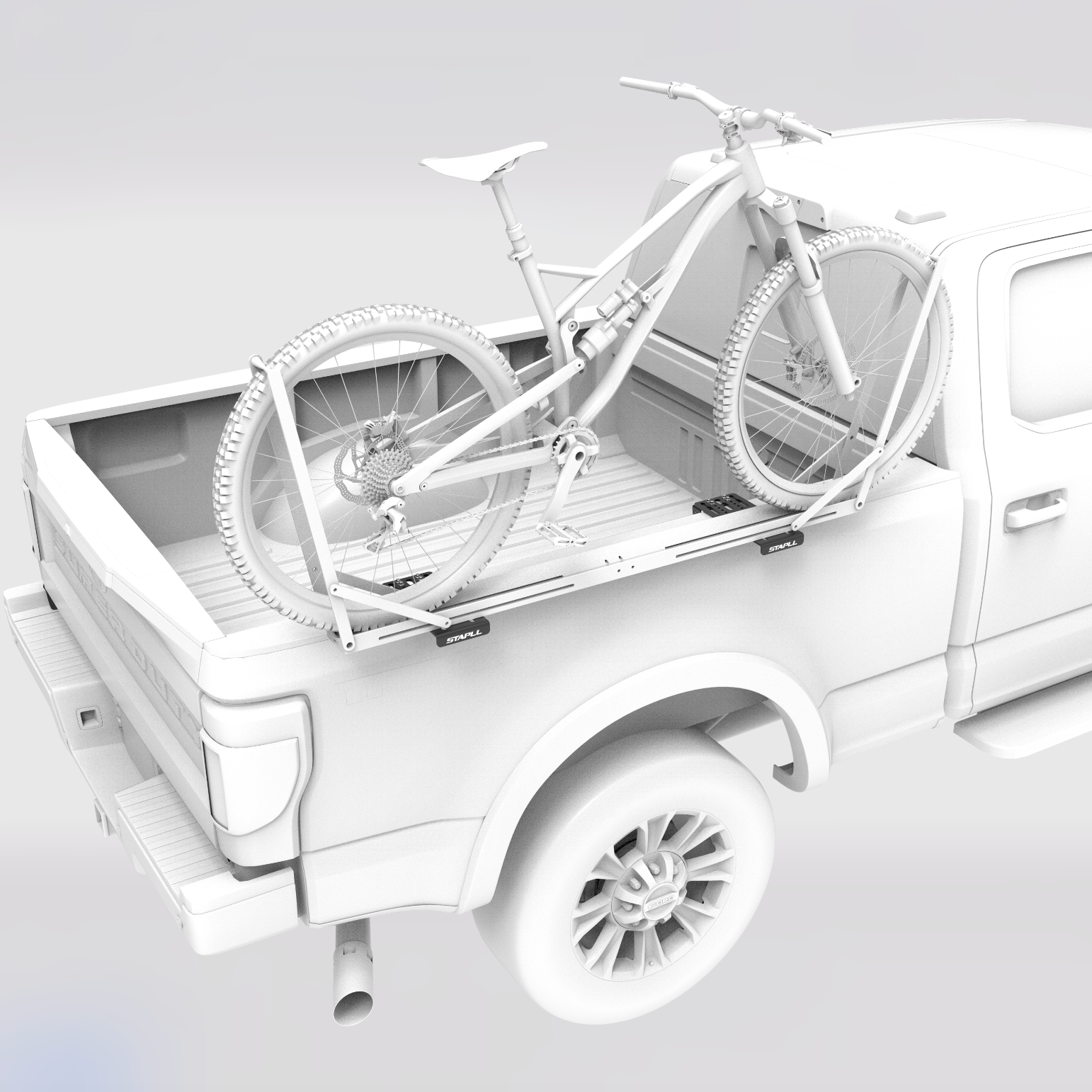 A white mountain bike mounted on a metal rack inside the bed of a white pickup truck, shown on a light gray studio background. STAPLL side mount bike rack.